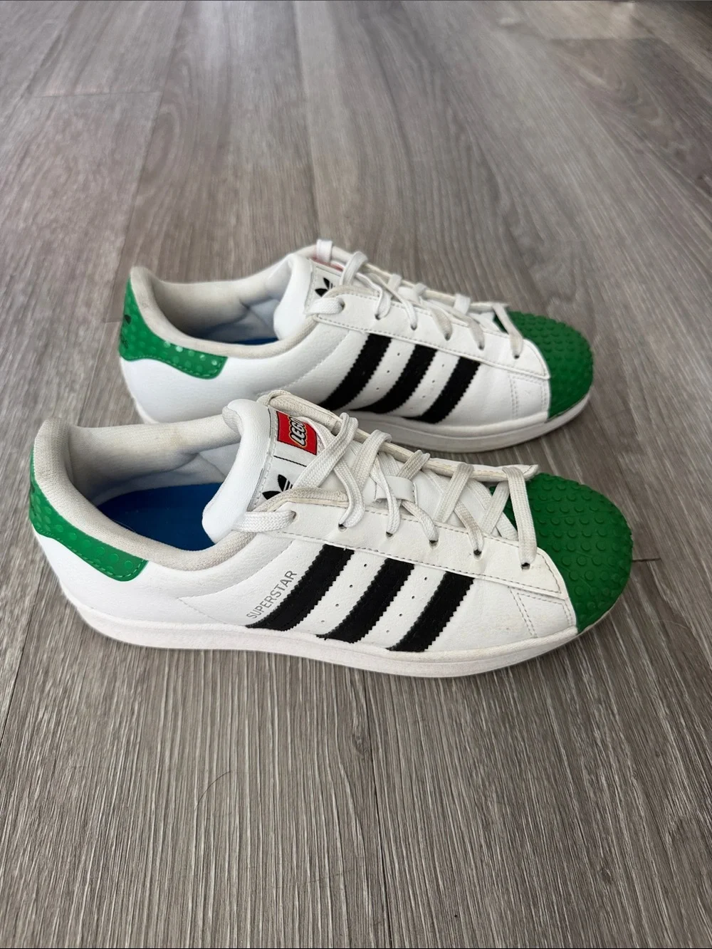 Adidas Men’s Lego’s Edition Superstar Sneakers in White, Black & Green